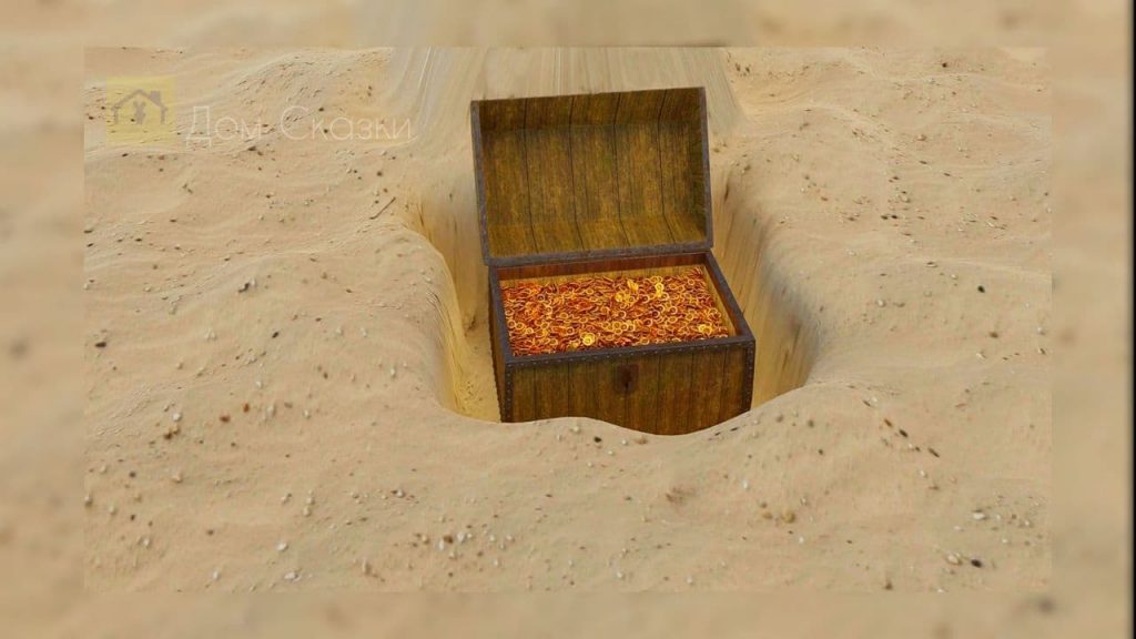 Сундук с золотом стоит открытый в вырытой песочной яме.